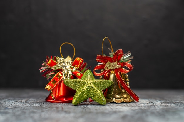 Front view holiday bells on light-grey table