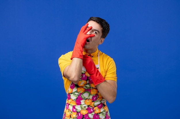 Front view housekeeper man putting hand on his face 