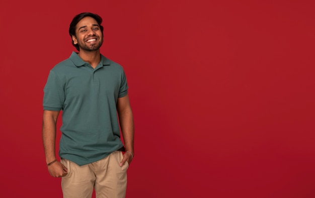 Free photo front view indian man posing in studio