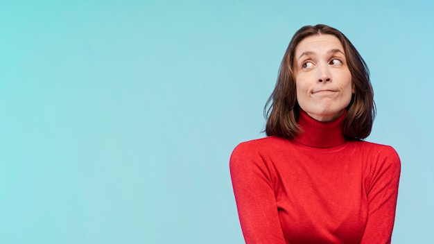 Front view of innocent woman posing with copy space