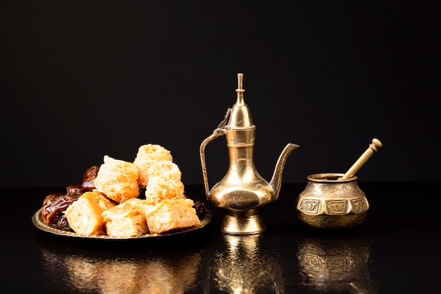 Front view islamic pastries with black background