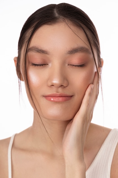 Free photo front view korean woman posing in studio