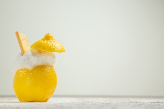 Front view lemon cocktails with ice on white table fruits citrus cocktail juice