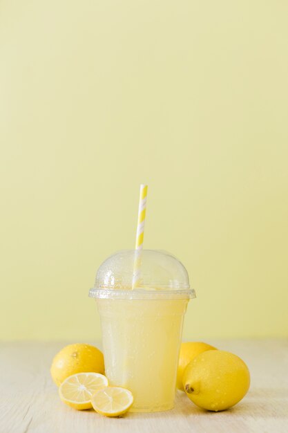 Front view of lemon shake with straw