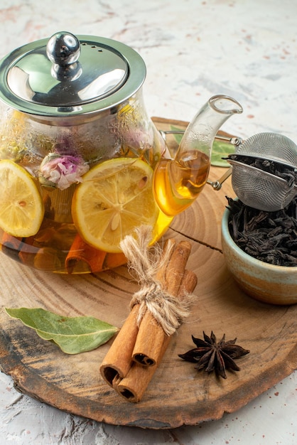 Front view lemon tea in kettle on a white background food color morning fruit breakfast ceremony flavor flower