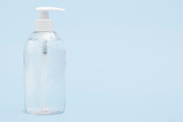 Front view of liquid soap in plastic bottle with copy space