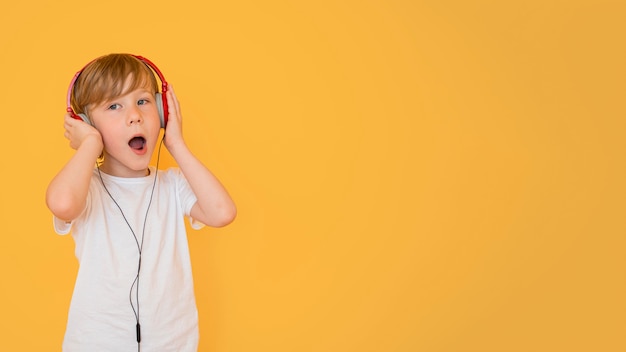 Front view of little boy with copy space