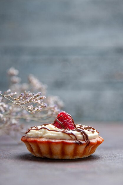 front view little creamy cake dessert for tea on a dark background biscuit sugar cake sweet pie