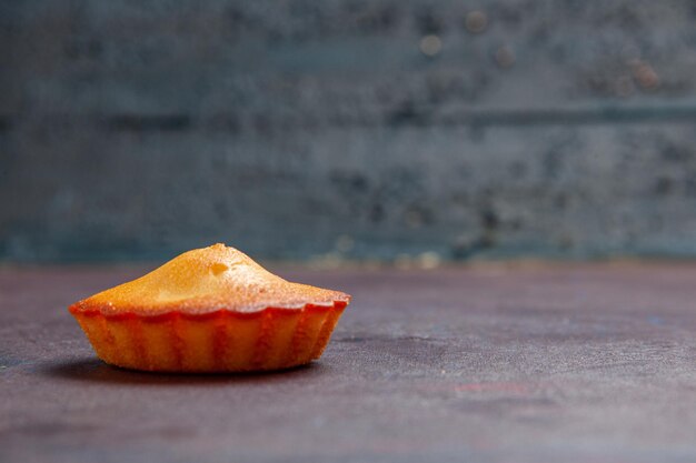 Front view little delicious cake on dark background pie biscuit cake sweet cookie sugar