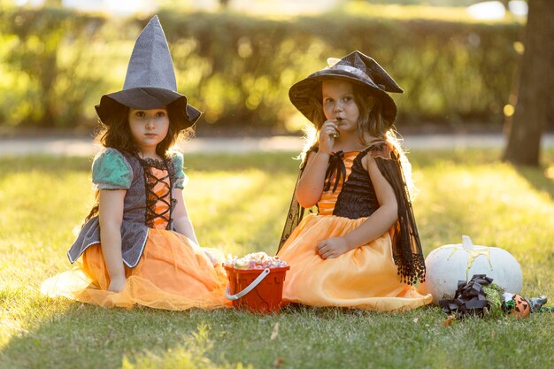 Front view of little girls in nature