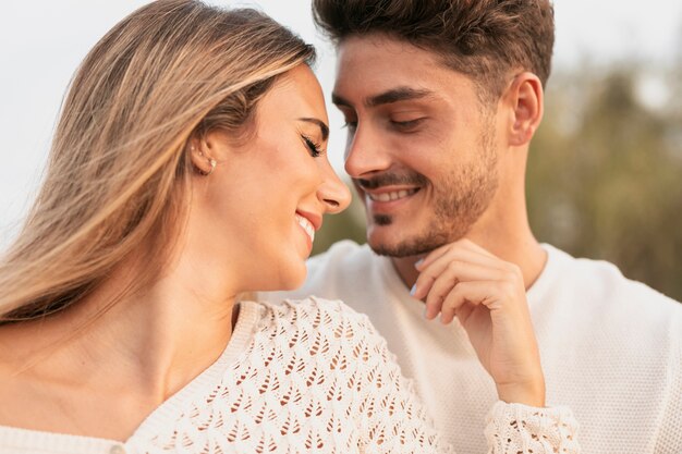 Front view of lovely couple smiling