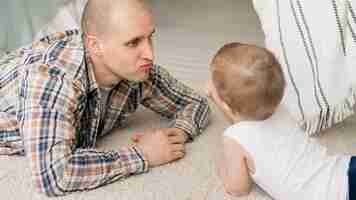 Free photo front view of lovely father and child