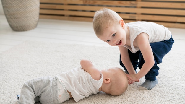 Front view of lovely kids playing