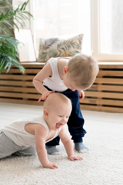 Free photo front view of lovely kids playing