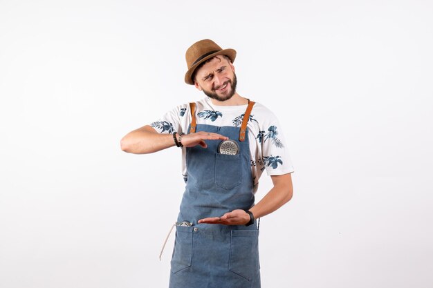 Front view male bartender showing size on white wall alcohol job club night drink bar