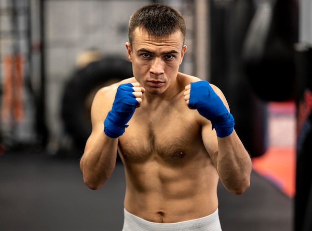 Front view of male boxer working out