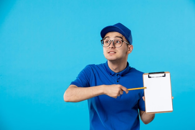 Front view of male courier with file note on blue 