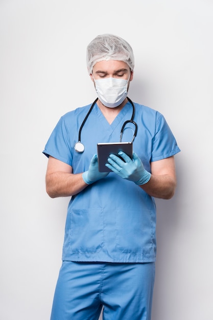 Front view male nurse checking information