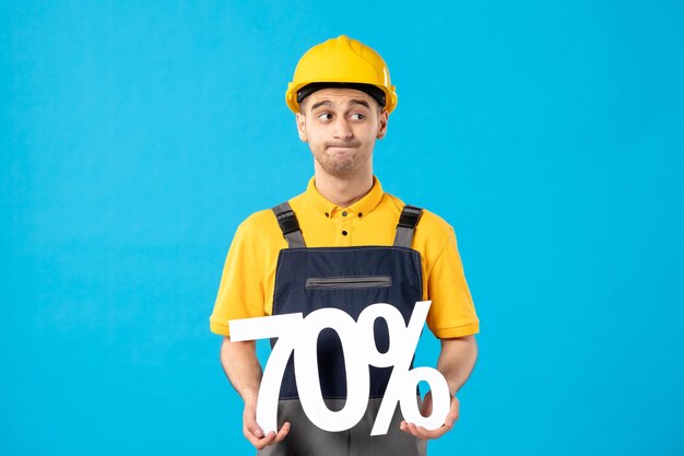 Front view of male worker in uniform with writing blue 