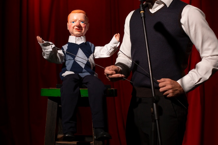 Free Photo front view man being ventriloquist