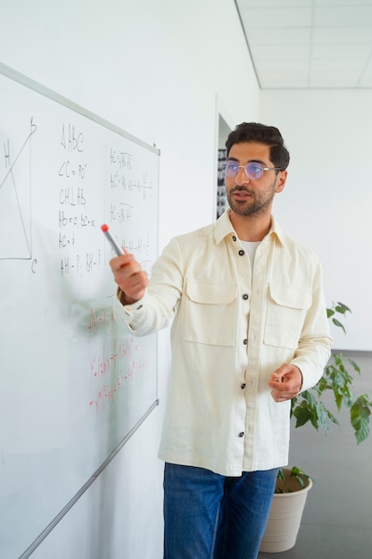 Front view man in classroom