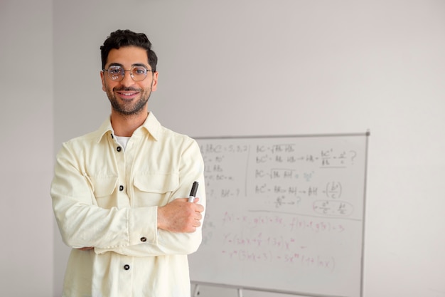 Free photo front view man in classroom