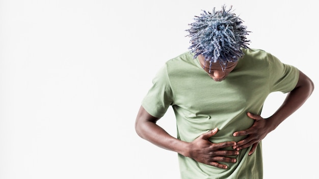 Free photo front view of man experiencing stomachache