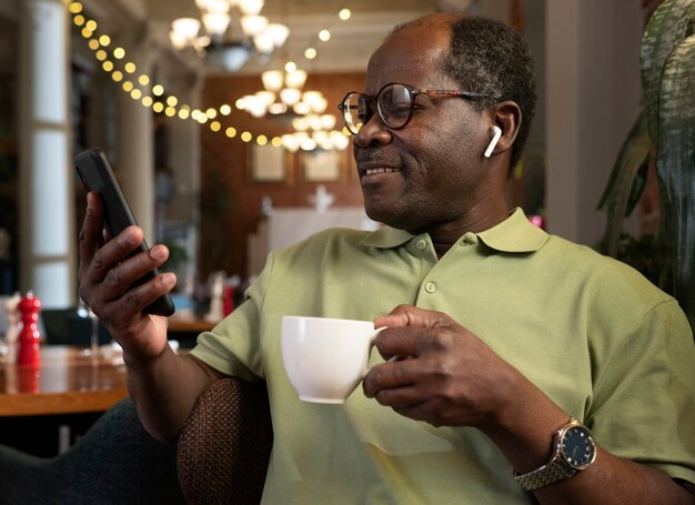Front view man having lunch at restaurant