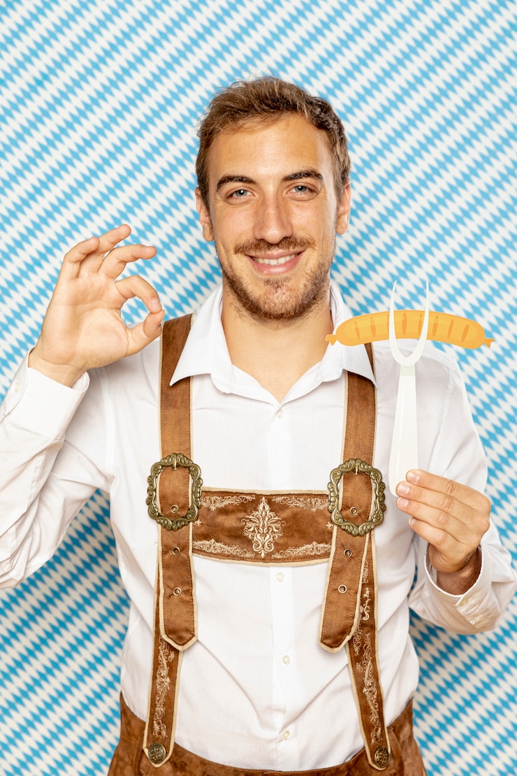Free Photo front view of man holding sausage