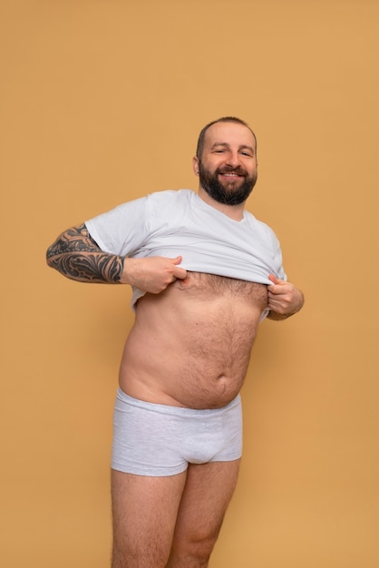 Free photo front view man inspiring bodypositivity