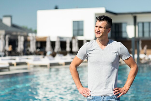 Front view of man at pool