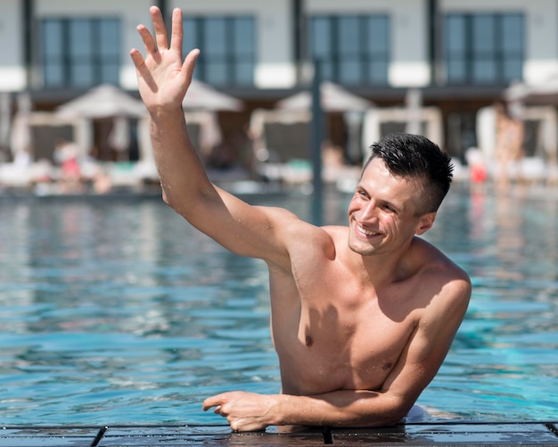 Free photo front view of man at pool