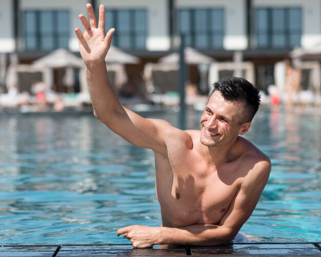 Front view of man at pool