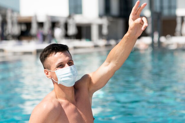 Front view of man at pool