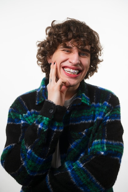 Front view man posing with dental gems