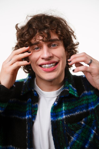 Front view man posing with dental gems