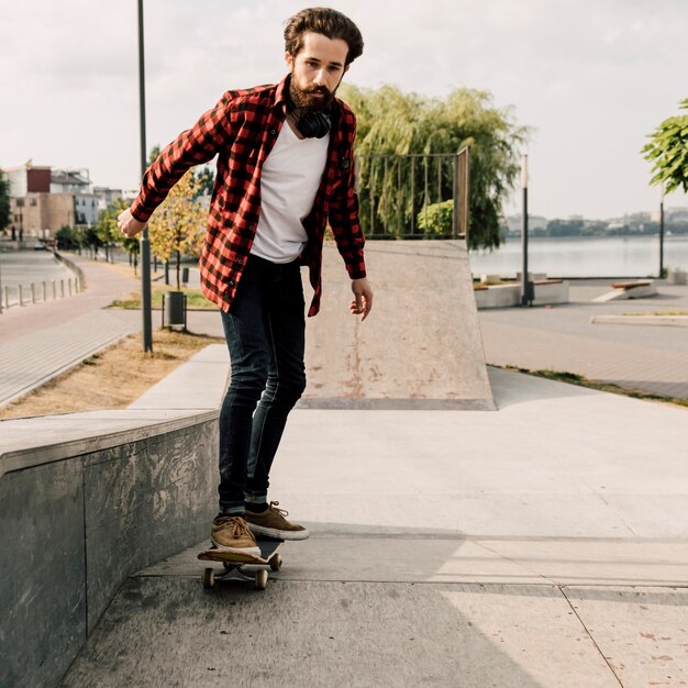 Front view of man at skate park