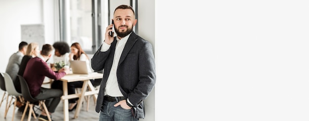 Front view of man talking at phone