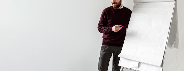 Free photo front view of man talking at phone