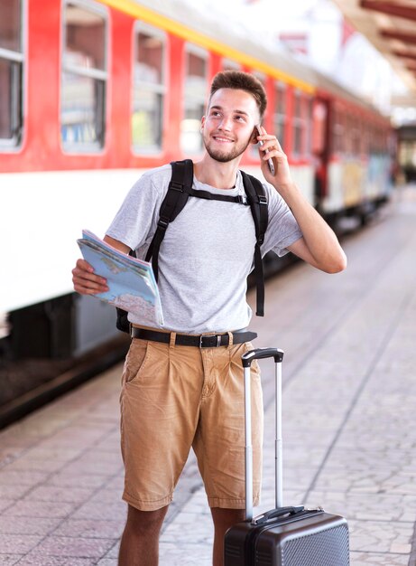 Front view man talking on phone