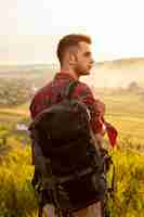 Free photo front view man with backpack