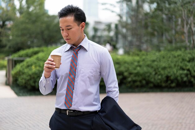 Front view of man with coffee cup