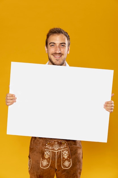 Front view of man with sign mock-up