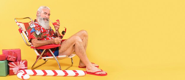 Front view of man with tropical shirt and copy space