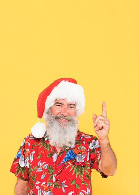 Front view of man with tropical shirt and copy space