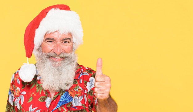 Front view of man with tropical shirt and copy space