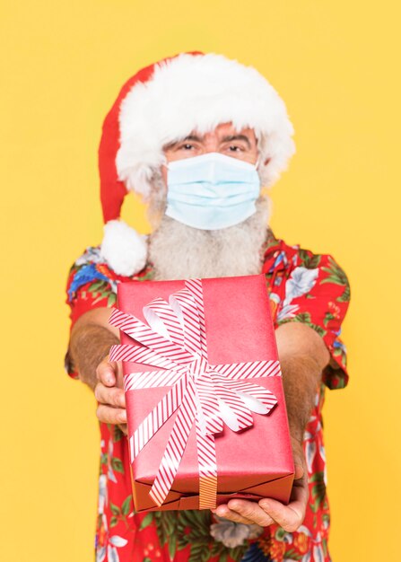 Front view of man with tropical shirt and copy space