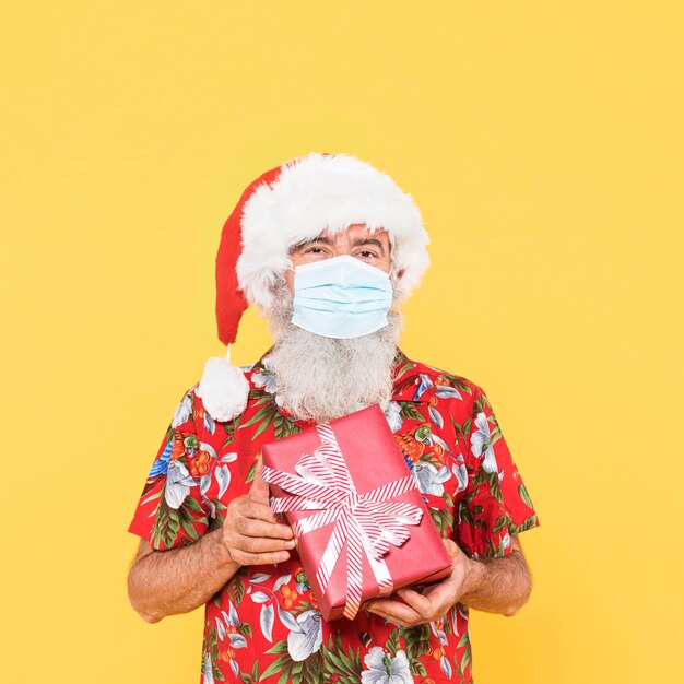 Front view of man with tropical shirt and copy space