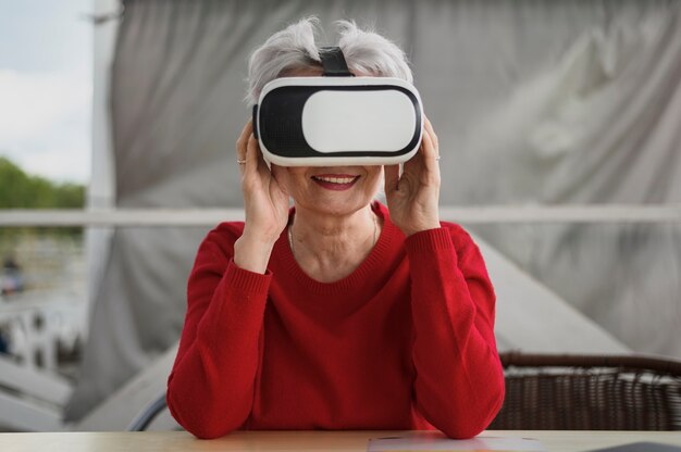 Front view mature woman trying a vr
