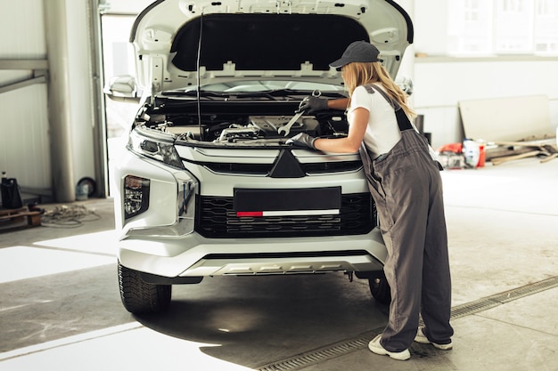 Front view mechanic woman working